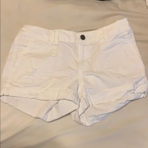 mossimo white mid rise shorts with rips